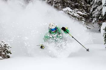 Skier skiing deep powder at Jackson Hole Mountain Resort